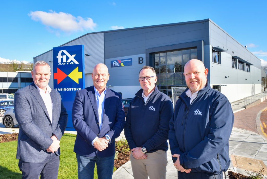 Simply magnificent… and open for business! Ian Pugh (second left), Managing Director for the Advantage Group of Companies that Fix Auto UK sits within and Fix Auto UK’s Operations Director Mark Hutchins (left) congratulate Fix Auto Basingstoke owner Dale Morris and his Group Manager Mark White (right) on the opening of the brand-new facilities believed to be among the most sustainable in the sector.