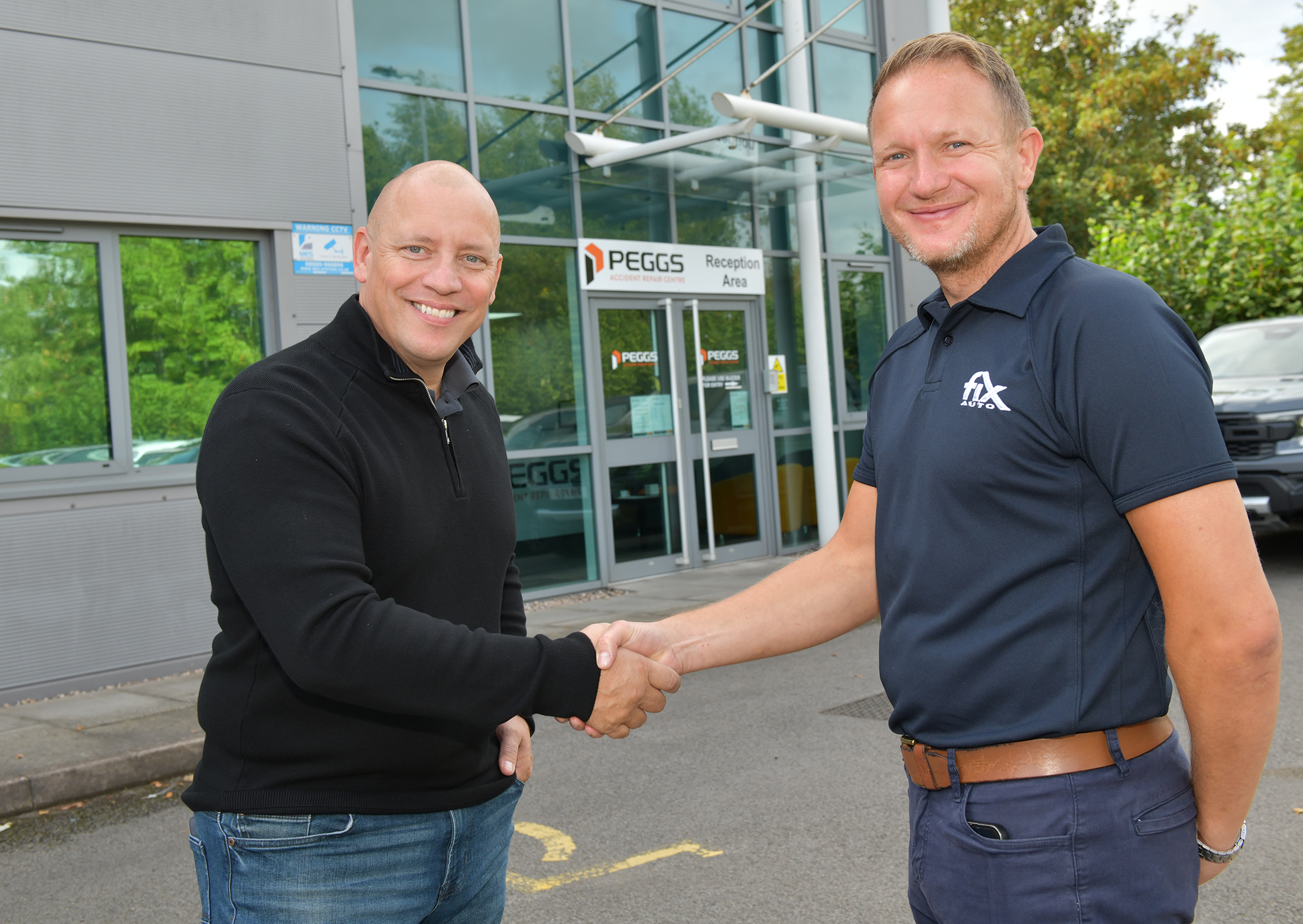 A handshake to mark the start of a new chapter…Richard Pegg (left), owner of Peggs Accident Repair Centre, formally seals the business’s appointment to Fix Auto UK with the organisation’s Head of Business Development Martin Willis.