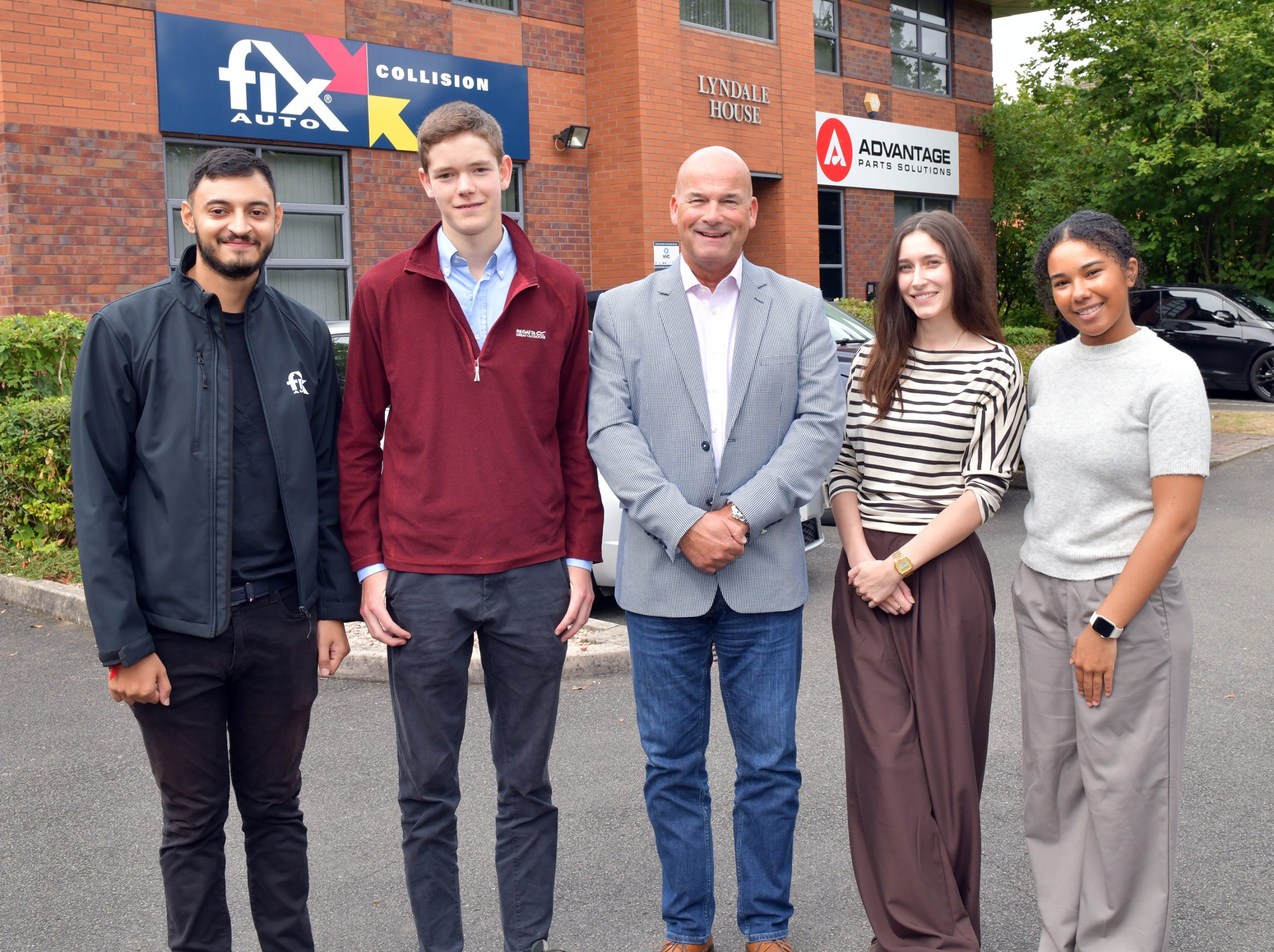 First day, new chapter! Ian Pugh, Managing Director for the Advantage Group of Companies that Fix Auto UK lies within, ushers in a new era in recruitment with the vehicle repair sectors’ first degree apprentices Tiah Glasgow (right) and Dominic Khan (second left) with their respective mentors Helen Smith (second right) and Rickesh Chohan (left).